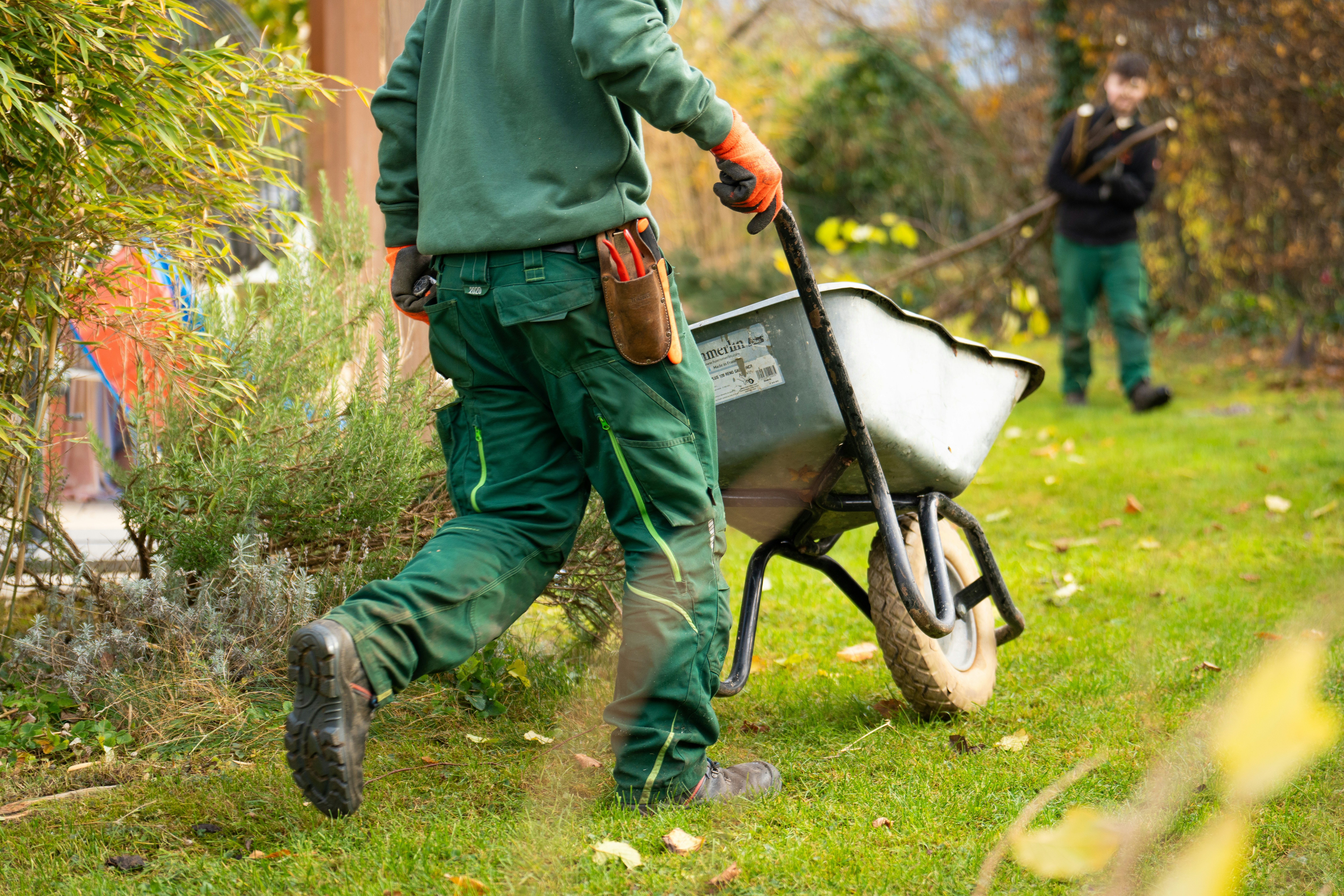 Landscaping worker with wheelbarrow — San Antonio handyman service